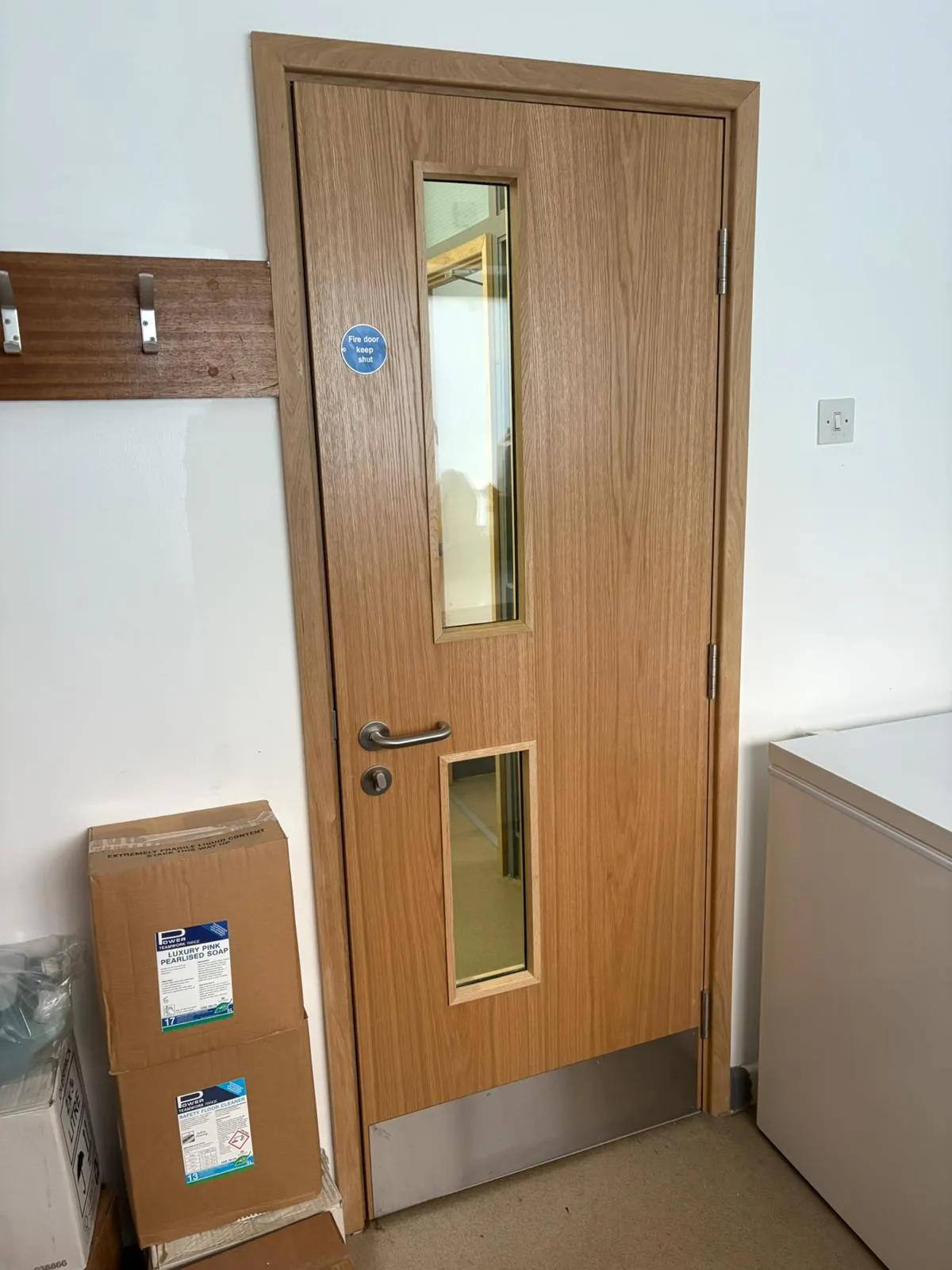 Fire-rated door fitting